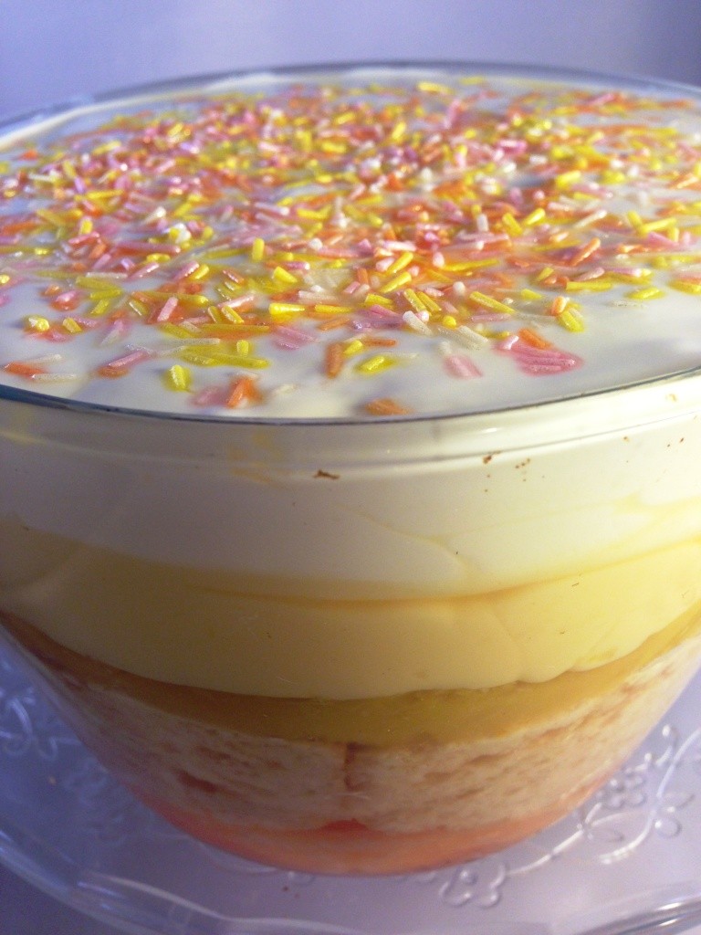 orange and mango trifle for great blogger bake off cake jelly custard cream sprinkles on top