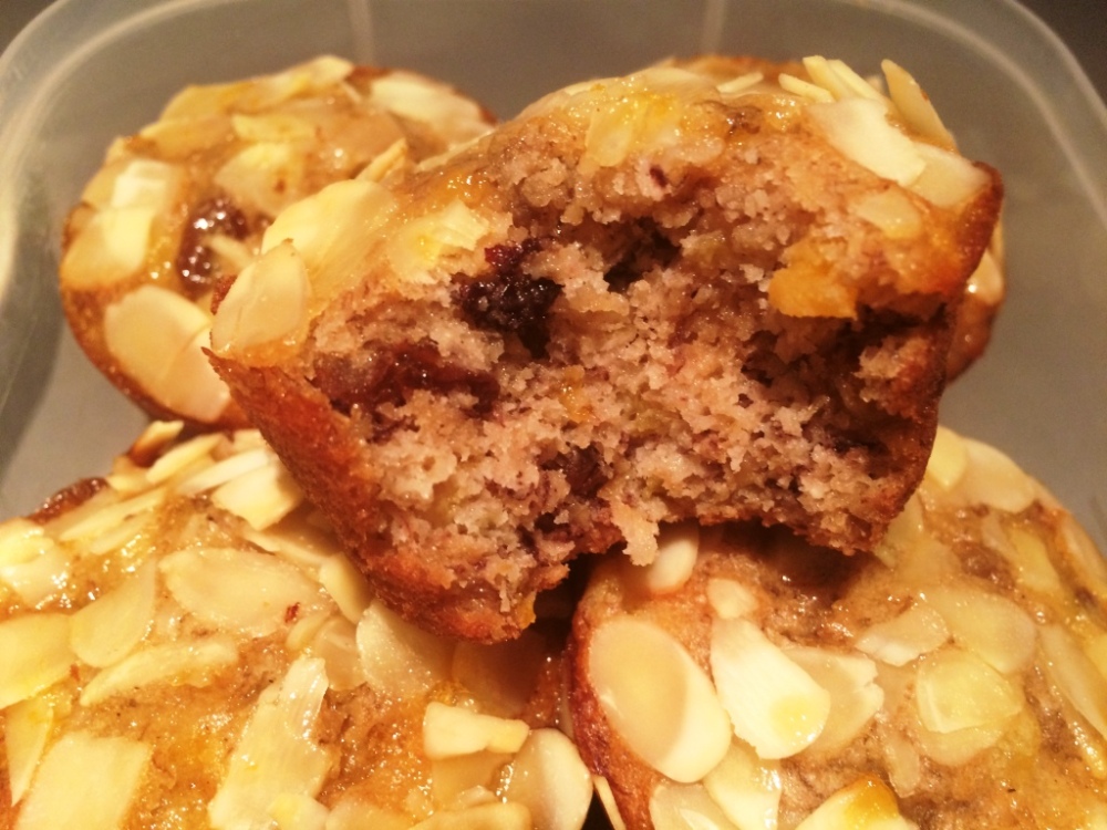 bite taken out of banana apricot and almond muffins gluten and dairy free moist and light recipe